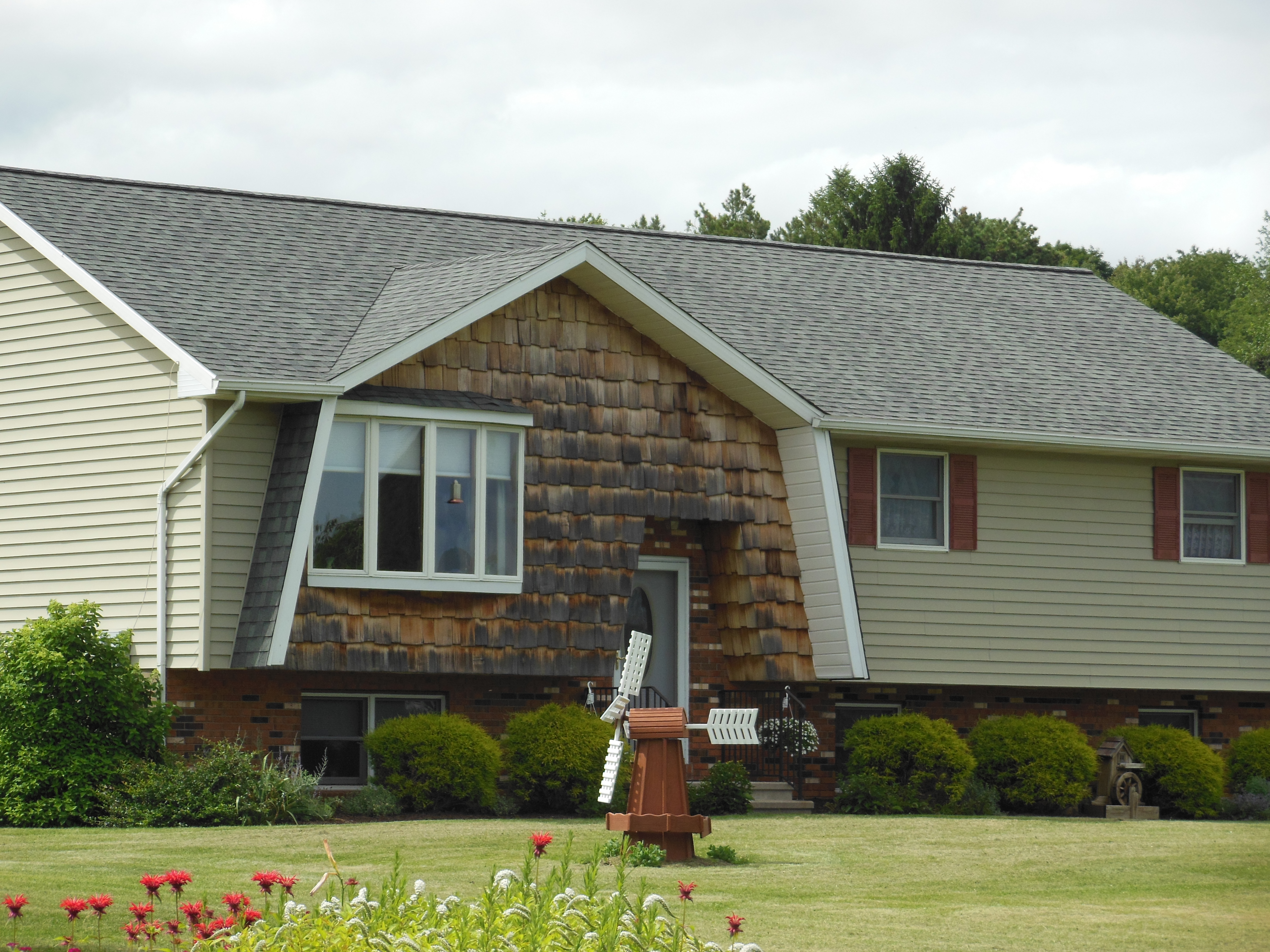 ShingleMe roofing crew on a completed roof